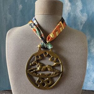Bold Brass Horse Medallion Pendant on Printed Silk Scarf